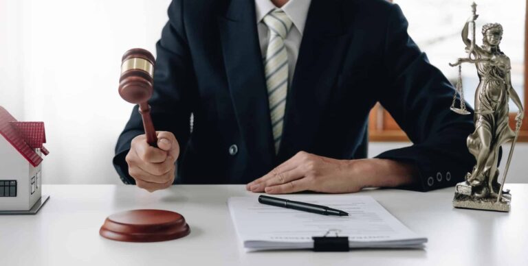 lawyer or judge holding hammer prepares to judge the case with justice and litigation scales of